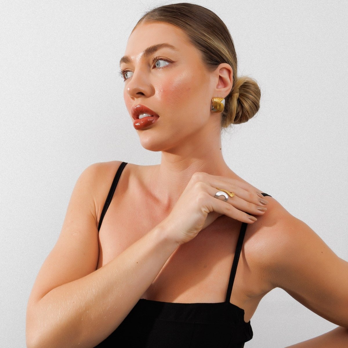 Adjustable Infinity Ring with a Mix of Gold and Silver Plating